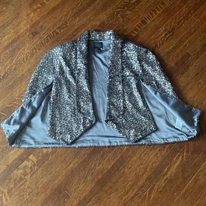 Silver sequin cape. Size large.